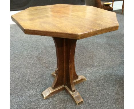 Robert 'Mouseman' Thompson - An oak occasional table of octagonal form, the adzed top above a quatre-foil pedestal base with 