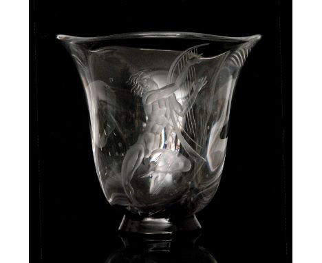 Vicke Lindstrand - Orrefors - A 1930s clear crystal glass vase of fluted bell form with a wave rim raised to a circular black