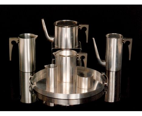 Arne Jacobsen - Stelton - A Cylindaline stainless steel tea and coffee service comprising teapot, coffee pot, hot water pot, 