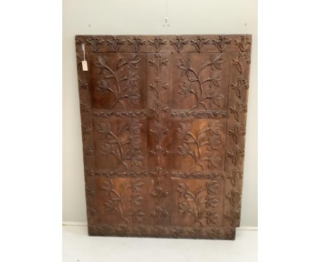 An Indonesian rectangular carved hardwood panel, width 134cm, height 170cm