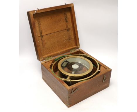 A cased brass compass impressed PATT 029P, 24cm in diameter
