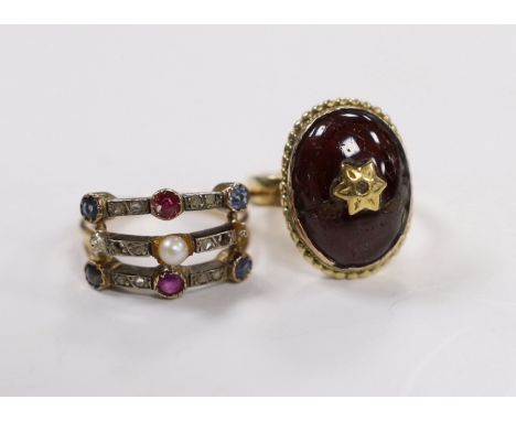 A late Victorian yellow metal, ruby sapphire, diamond and seed pearl set half hoop triple shank ring, size K, together with a