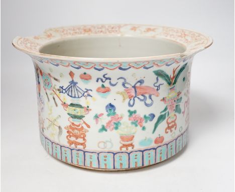 A late 19th century Chinese famille rose planter, decorated with precious objects, 16.5cm high (a/f)