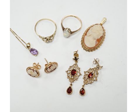 Two 9ct and gem set rings, including diamond chip and white opal, a 9ct and amethyst set pendant necklace, pair of 9ct gold a