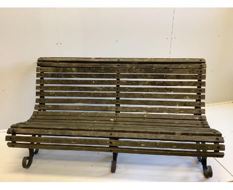A wrought iron slatted wood garden bench, length 153cm, depth 80cm, height 78cm