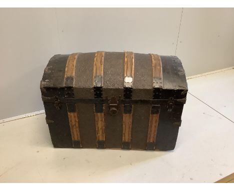 A Victorian embossed leather, wood and metal domed topped trunk, width 87cm, depth 48cm, height 64cm