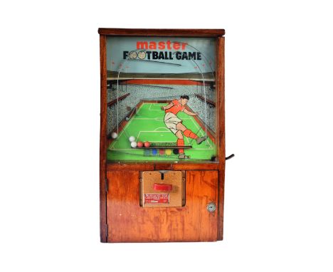 Fairground / Arcade: An original vintage Mastermatic made ' Master Football Game ' penny arcade slot machine. Wooden cabinet,