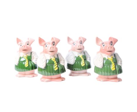 A set of four vintage NatWest piggy bank sister Annabel pigs. All having stoppers. Measure approx 16cm.