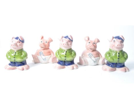 A set of five vintage NatWest piggy bank pigs. The lot to include two baby Woody pigs &amp; three cousin Wesley pigs. Most wi