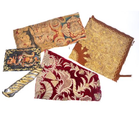 Five small scraps of antique textiles, to include an antique red velvet and gold stumpwork Persian / Indian piece from a slee