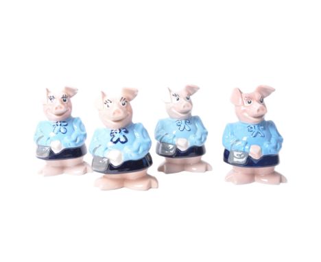 A set of four vintage NatWest piggy bank mum Lady Hilary pigs. All with stoppers bar one. Measure approx 18cm.