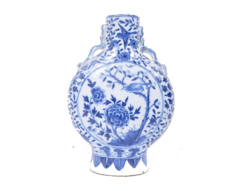 A 19th century blue and white Chinese twin handled moon flask vase. Depicting figures in an external scene, repeated pattern 