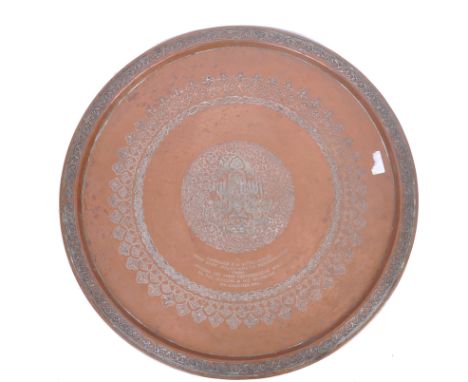 A 1946 WW2 - 20th Century Islamic Egyptian antique Cairoware brass wall charger. The charger of circular form having intricat