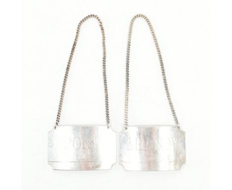 Concorde Interest - a pair of hallmarked silver decanter labels for ' Brandy ' and ' Port '. Both complete with original chai