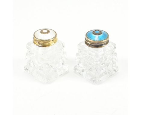 A set of Norwegian silver enamel salt and pepper cruets shakers. The cruets having glass bases with silver gilt and guilloche