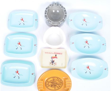 An assorted collection of vintage advertising ashtrays. The lot to include; six ceramic Johnnie Walker whisky pale turquoise 
