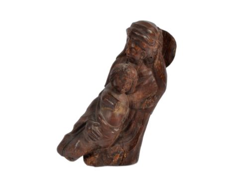 A 20th century oak carving of mother and child. Carved from a single piece, believed to represent the Virgin Mary and Child o