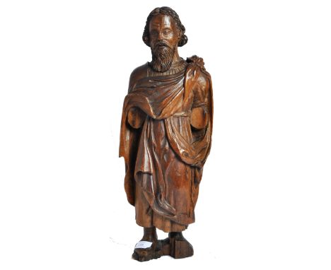 A 19th century continental, possibly German, cloaked religious / Biblical figure carved from fruitwood, possibly St. Peter or