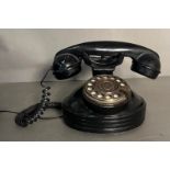 A Vintage Bakerlite Rotary phone