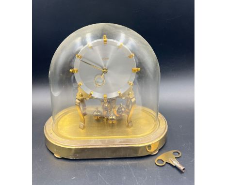Kundo German clock, glass dome 