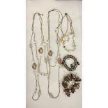 A selection of costume jewellery, layering long necklaces and sweetie bracelets etc