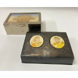 Two trinket boxes, one with a pair of portraits to front