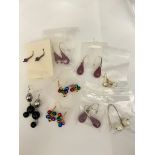 A collection of costume jewellery earrings including Christmas themed baubles