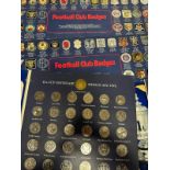 A selection of Esso collectable tokens, football badges etc