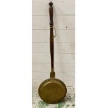 A brass bedwarmer