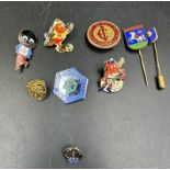 A selection of vintage pin badges and tie pins, various subjects to include the Scottish piper