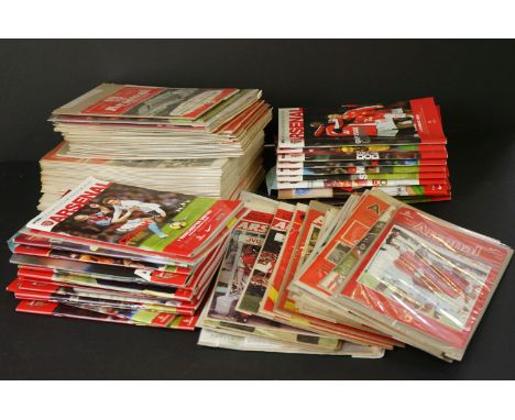 Collection of Arsenal home football programmes form the 1950s to the 2000s to include first game at Emirates, last season at 