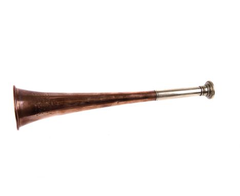 A nickel mounted copper hunting horn, marked to the body ‘Swaine & Adeney 185 Piccadilly London’ 24cm L 