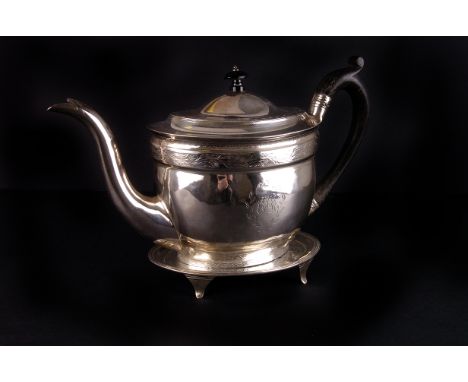 A George III Scottish silver teapot and stand by McHattie and Fenwick, Edinburgh 1802, the oval body with engraved thistle ba