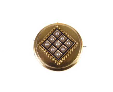 A Victorian cased mourning brooch, the circular pinchbeck mount set with nine seed pearls in enamel square, having glazed pan