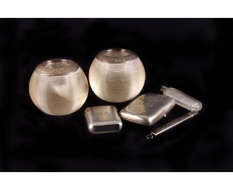 A Chester hallmarked silver vesta case, 1908 by Sampson Mordan &amp; Co, together with a silver capped perfume bottle, cigare