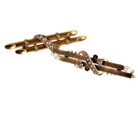 Two Victorian 15ct gold and seed pearl brooches, both of a similar design with two bars and a central trail of small white pe