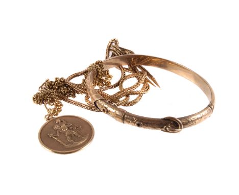 Two 9ct gold necklaces and a bangle, one of the necklaces having chevron links and tied knot with tassels, the other a round 