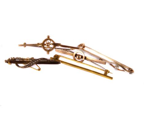 A group of five Victorian and later gold bar brooches, including a cased 15ct gold, platinum and seed pearl example and four 
