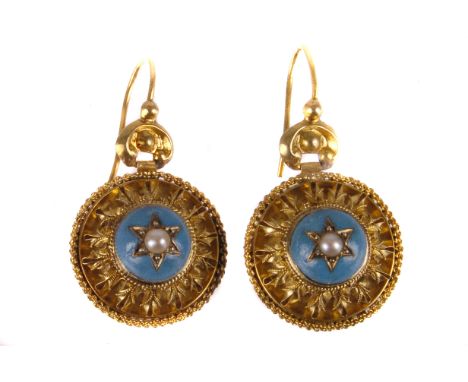 A pair of Victorian pinchbeck and enamel earrings, the circular domed mount with ornate leaf surround and centred with turquo