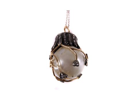 A 19th century large baroque pearl pendant, the white pearl in gold wire support with heart and leaf shaped applied motifs se