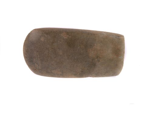 ANNOUNCE THIS LOT WILL INCUR VAT ON THE HAMMER PRICE
A stone axe head, Ecuador 700-1533AD 14cm L