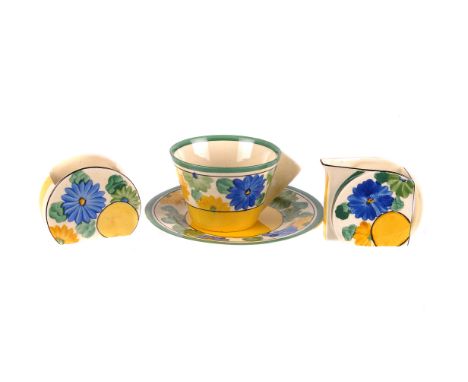 A Clarice Cliff for Newport Pottery tété à tété, from the Bizarre range and in the high Art Deco form, in the pattern of Sung