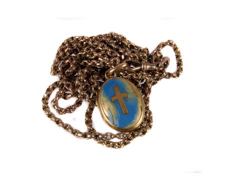 A Victorian or Edwardian 9ct gold muff chain, the opera length chain with watch clasp and French gold and enamel locket, appr