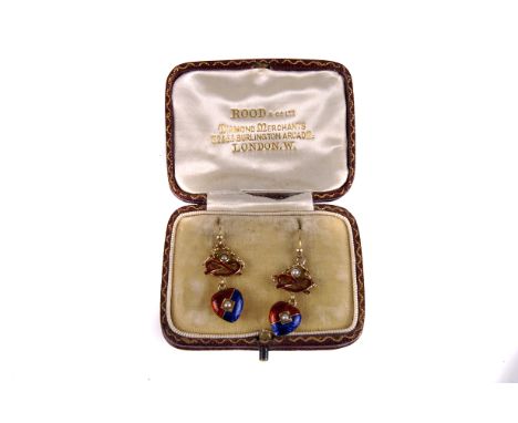 A pretty pair of gold and enamel earrings, with heart shaped drops in red and blue guilloche enamel centred with a seed pearl