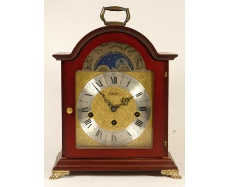 A modern Franz Hermie bracket clock, mahogany cased with moonphase and jewelled 8 day movement striking on gongs. 28cm tall. 