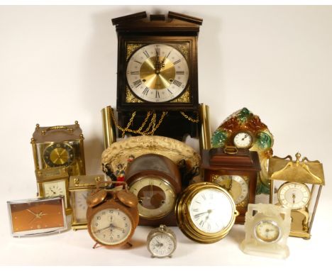 A collection of mid 20th century and later mantel clocks, having manual wind and quartz movements, in two boxes. (2) 