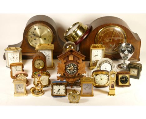 A collection of mid 20th century and later mantel clocks, having manual wind and quartz movements, in three boxes. (3) 