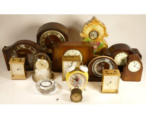 A collection of 20th century quartz clock to include mantle clocks, anniversary clocks and a contemporary brass lantern clock