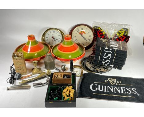 Two 20th century carved chess sets to include one in a Jacques box together a John Smith wall clock, Guinness bar towels and 
