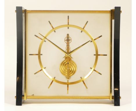 A 20th century Jaeger leCoultre brass black Perspex cased mantle clock, impressed 435 4047 to one foot, 15cm high.  Scratches